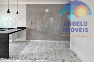 Casa com piscina á venda no bairro Flora Rica em Peruíbe