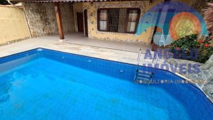 Casa com piscina á venda no bairro Oásis em Peruíbe