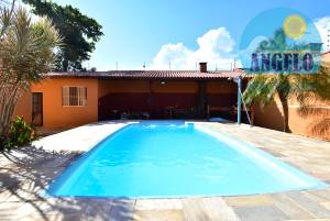 Casa com piscina para venda no bairro Jangada em Peruíbe, á 200 metros da praia