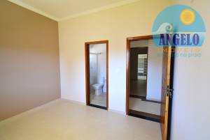 Casa terrea, piscina, 2 lotes, 200 metroos da praia á venda no bairro Ribamar em Peruibe