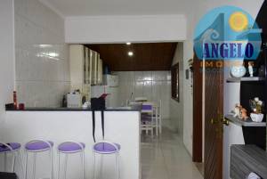 Casa com edicula proima ao Centro