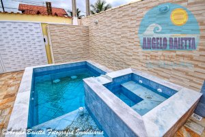 Casa com piscina á venda no bairro Park D Aville em Peruíbe