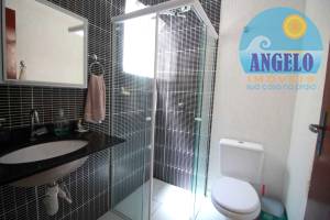 Casa terrea, com piscina, 3 dormitórios, sendo 1 suite, no bairro Continental em Peruibe