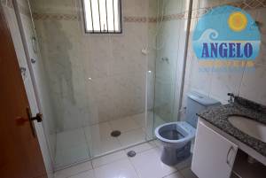 Casa com piscina á venda no bairro Stella Maris em Peruíbe