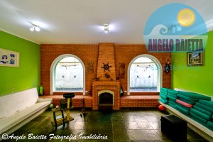 Casa com piscina á venda no bairro Stella Maris em Peruíbe