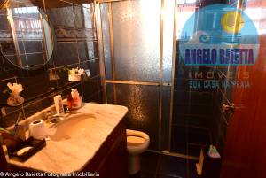 Casa com piscina á venda no bairro Costão em Peruibe